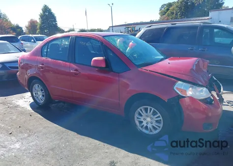 2013 Suzuki Sx4 Le/Le Popular z USA, uszkodzony, nr VIN JS2YC5A36D6100855